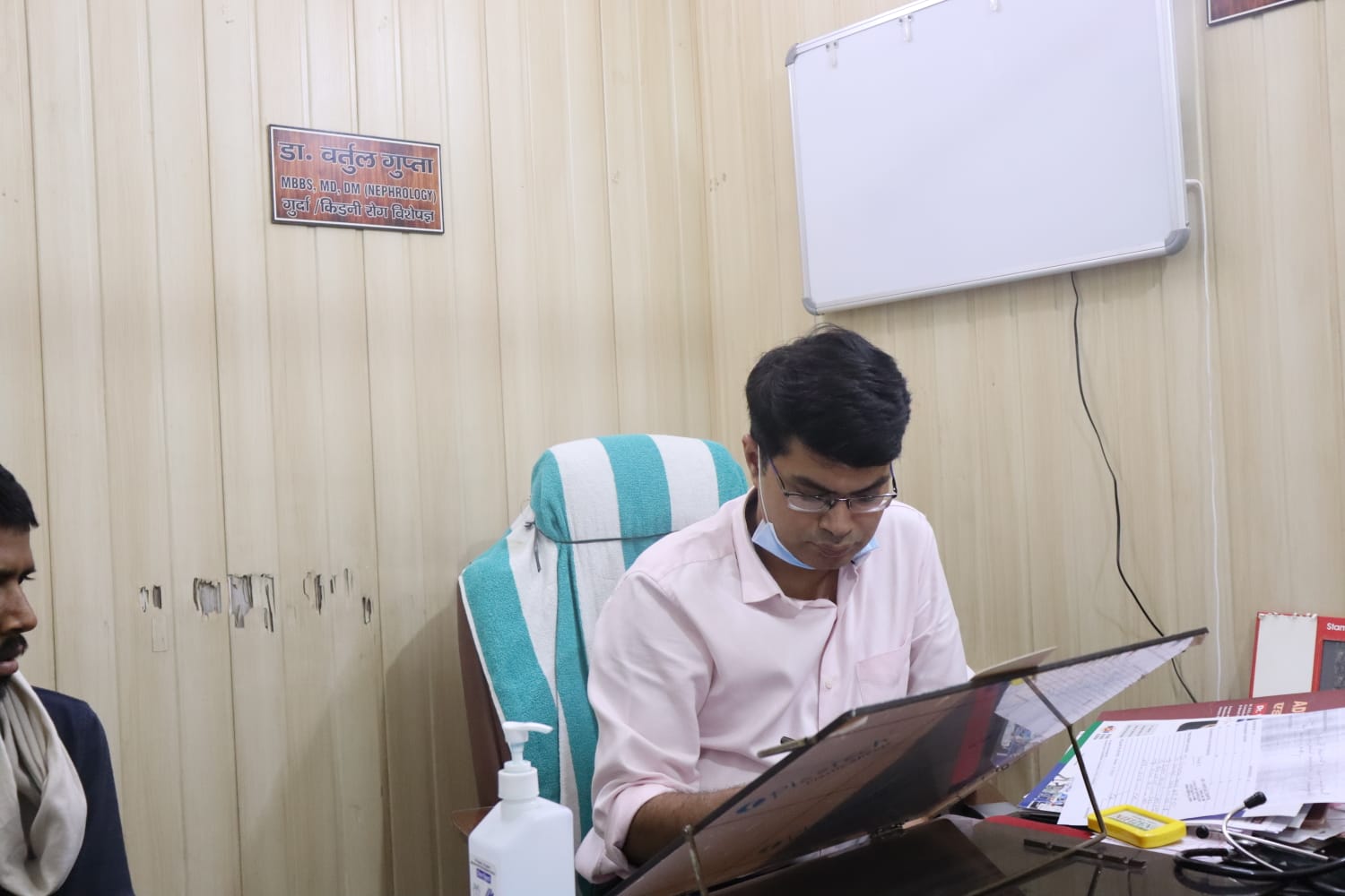 Dr. Vartul Gupta with patient